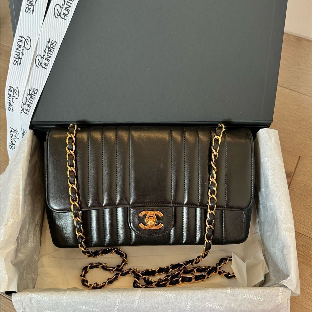 Chanel vintage classic medium vertical flap black lambskin 24k plated hardware